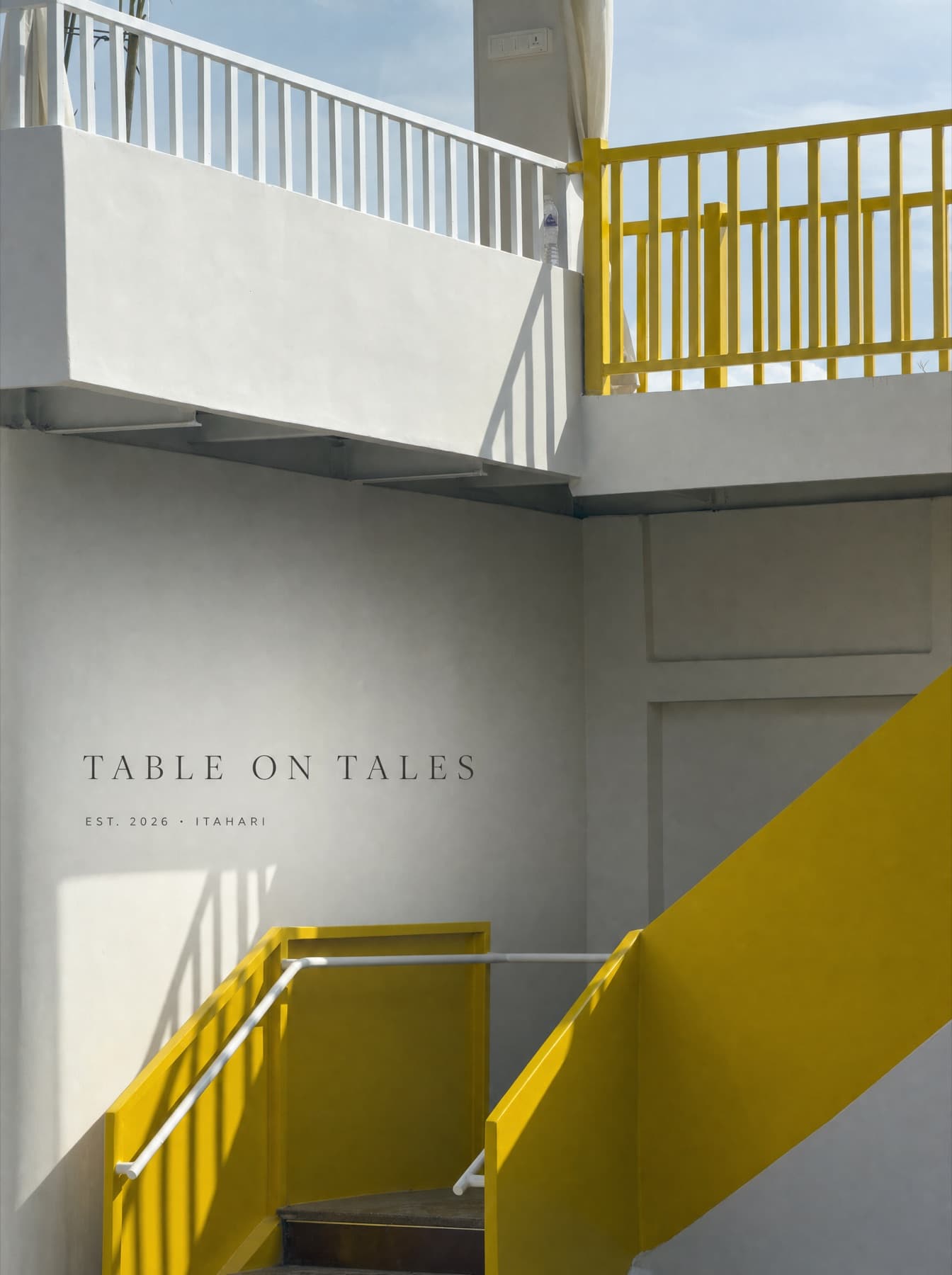 Table on Tales signage on the exterior stairwell